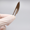 Lame de scalpel chirurgical stérile jetable en acier inoxydable avec rayonnement gamma