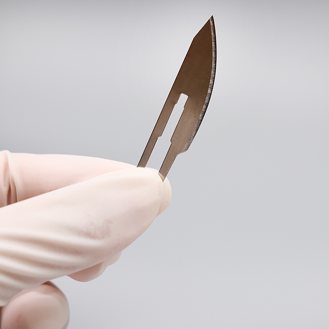 Lame de scalpel chirurgical stérile jetable en acier inoxydable avec rayonnement gamma