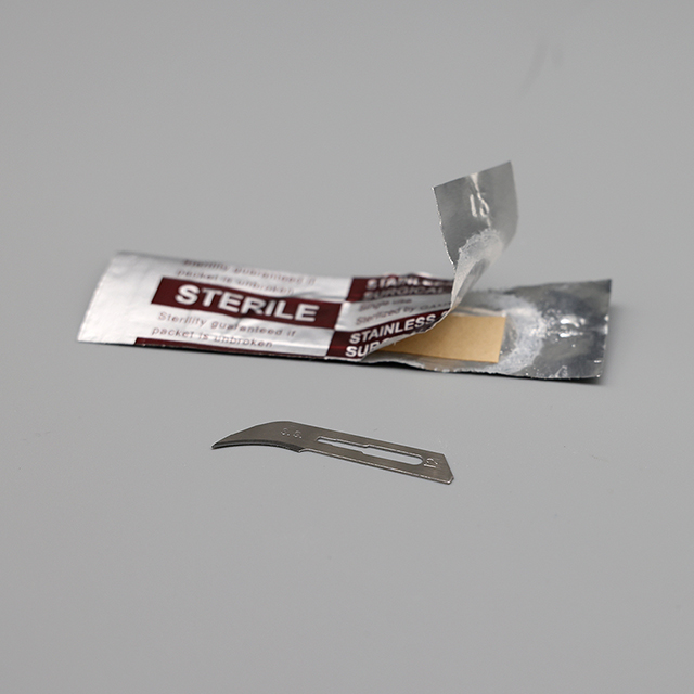Lame de scalpel chirurgical stérile jetable en acier inoxydable avec rayonnement gamma