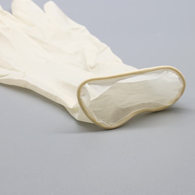 Gant d'examen en latex stérile sans poudre de haute qualité à usage unique